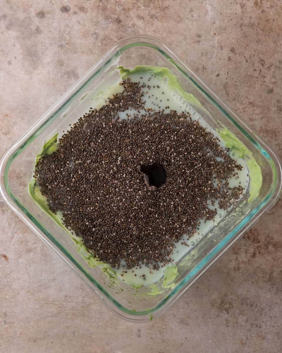 Chia seeds added to the matcha milk mixture before chilling