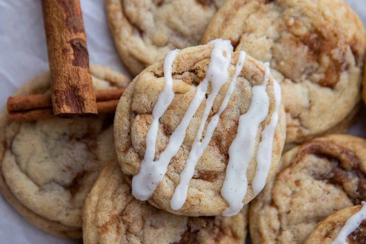 Cinnamon roll sugar cookies drizzled with vanilla bean glaze