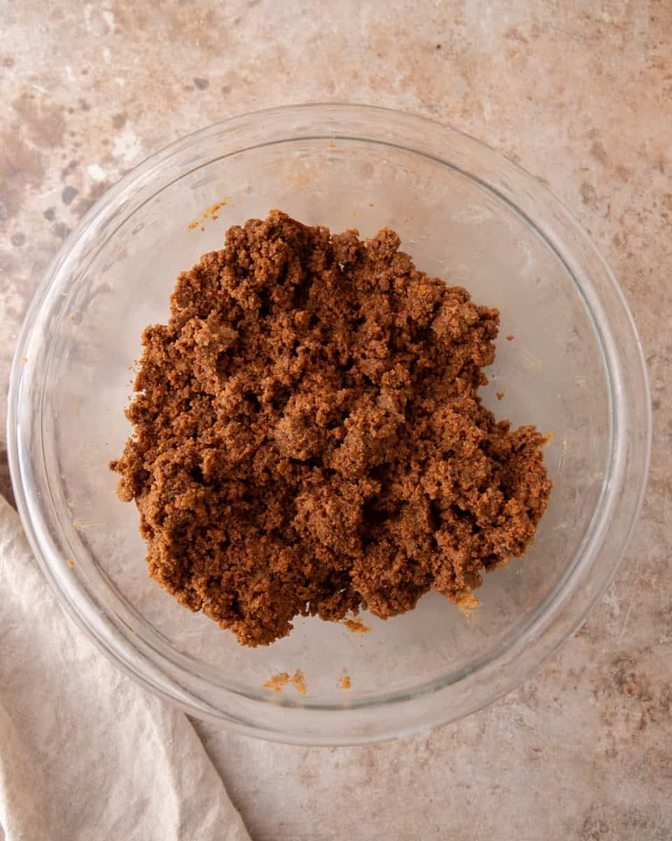 Spiced cookie butter cinnamon filling mixed into a soft, spreadable paste in a glass bowl