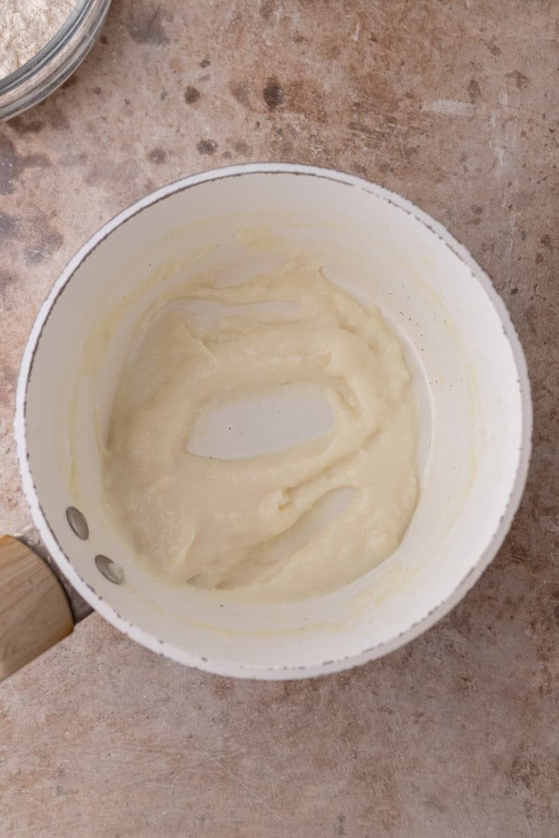 Tangzhong flour and milk paste cooked in a white saucepan