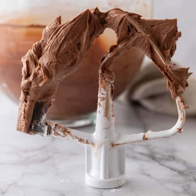 chocolate buttercream on a stand mixer paddle attachment