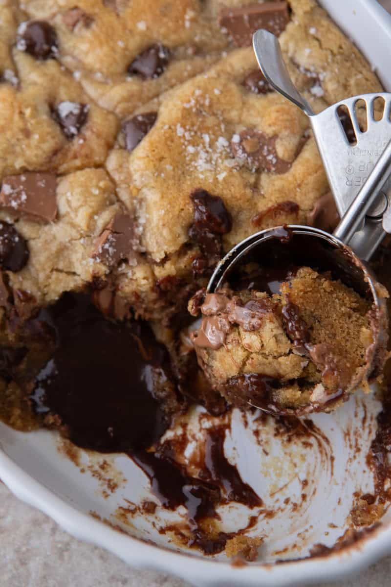 Warm chocolate chip cookie scoop with molten chocolate center