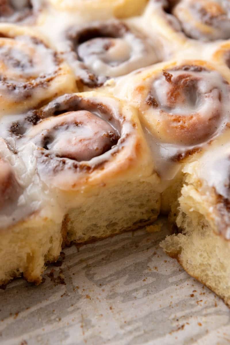 Close up side view of mini cinnamon rolls showing soft fluffy texture and layers