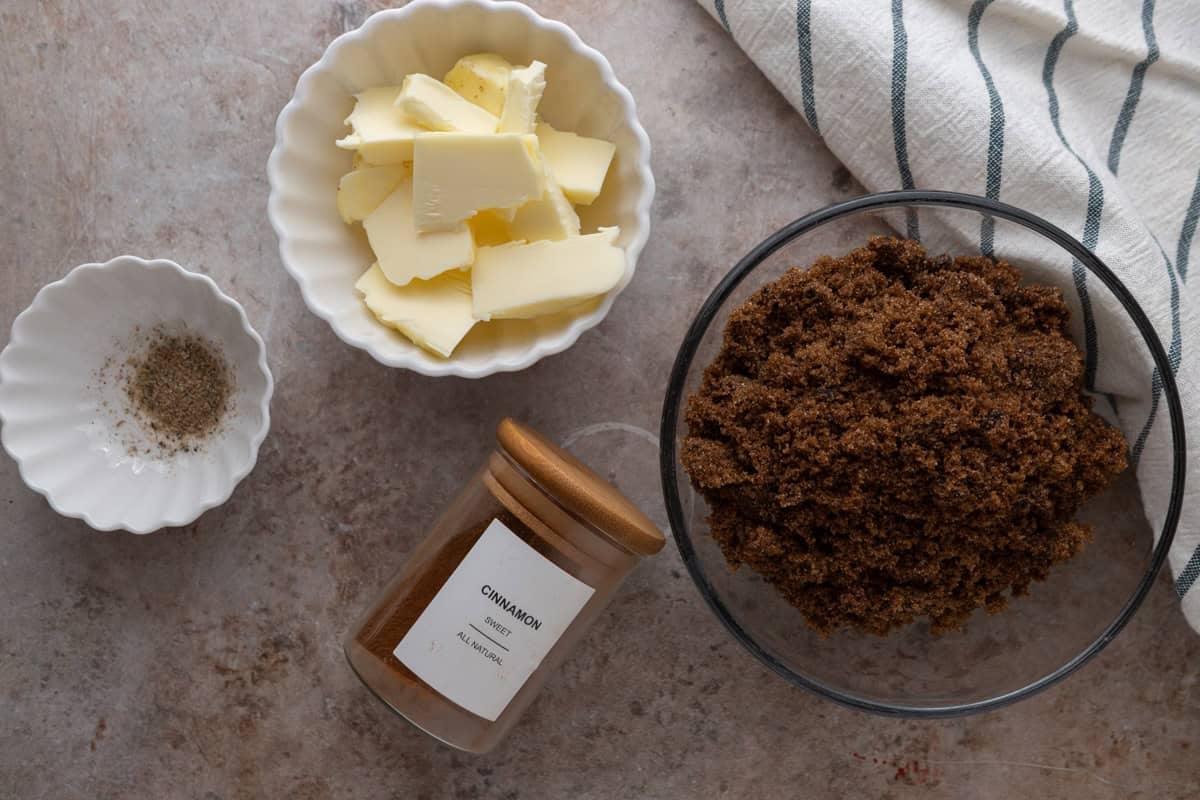 Cinnamon roll filling ingredients including softened butter, brown sugar, ground cinnamon, and ground cardamom