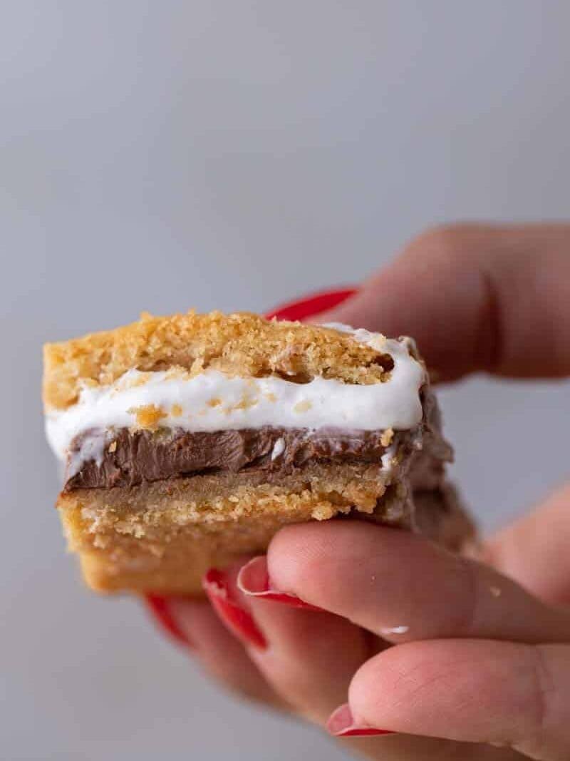 Hand holding s'mores bar cookies