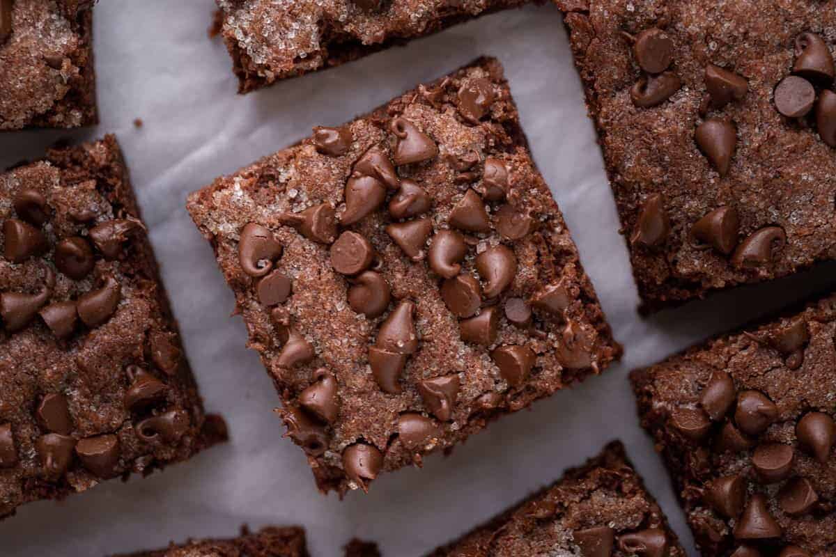 Chocolate sugar cookie bars topped with melty chocolate chips, an easy Mother's Day dessert recipe to gift or share