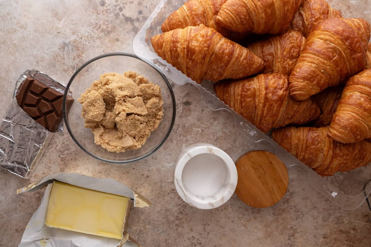 Croissant Christmas crack ingredients: croissants, brown sugar, butter, chocolate bar, and salt