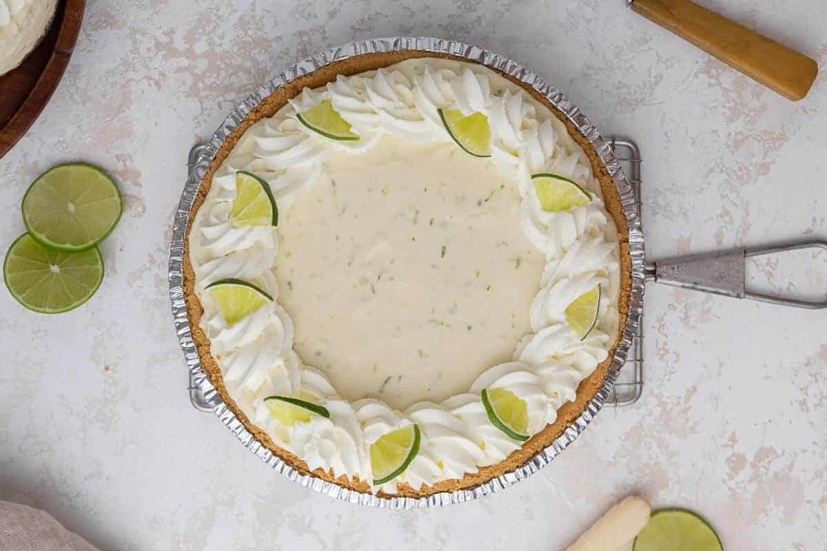 Overhead shot of a no bake key lime pie topped with whipped cream