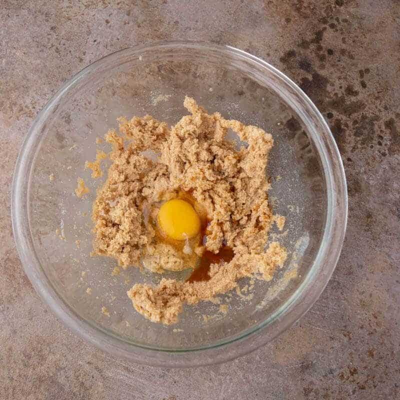 Creamed butter and brown sugar in a bowl.
