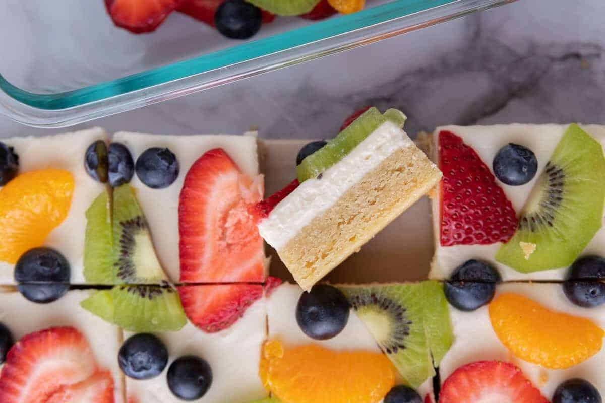 Patriotic fruit pizza bars, an easy 4th of July dessert topped with berries.