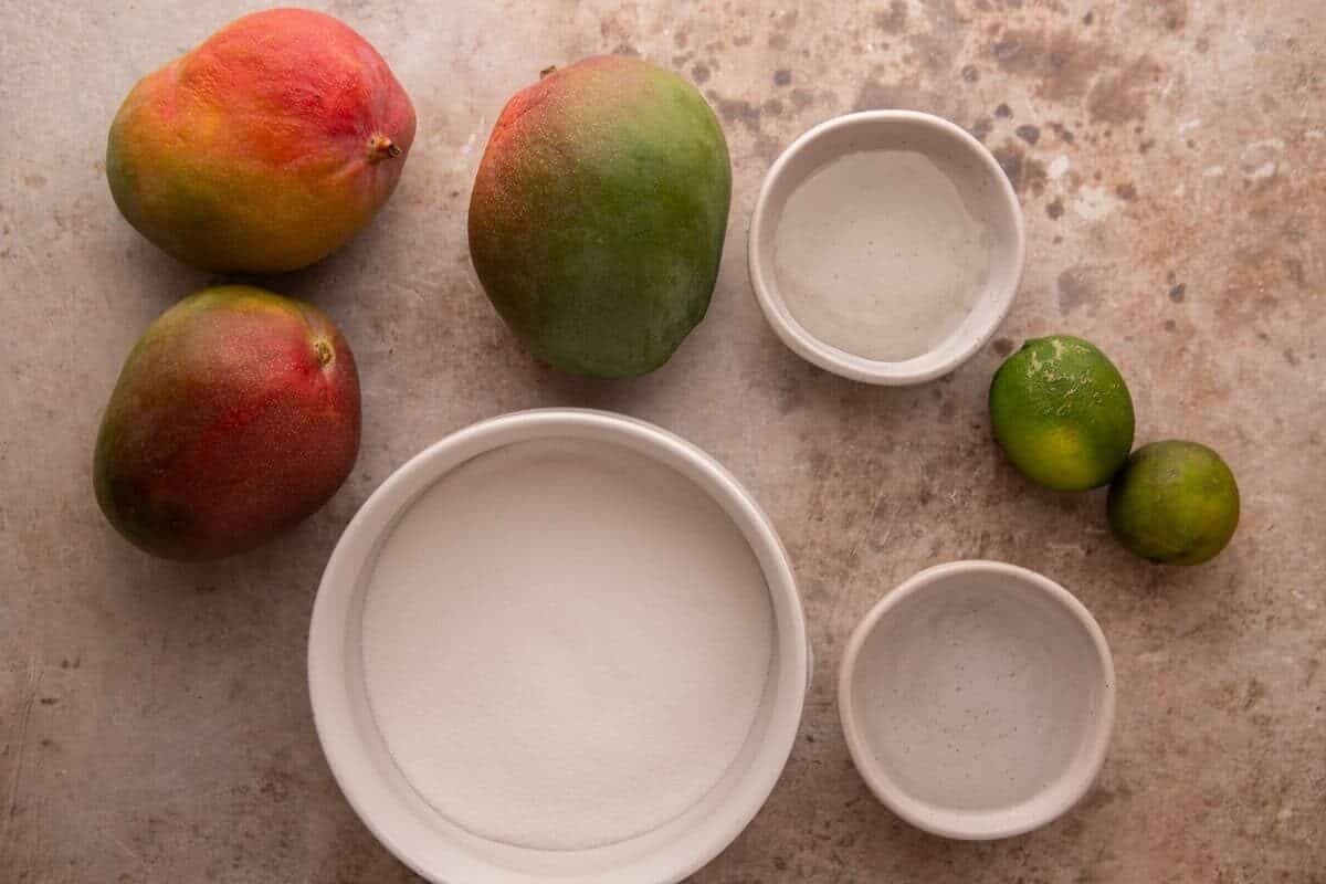Mango sorbet ingredients: fresh mangoes, sugar, water, lime, and salt