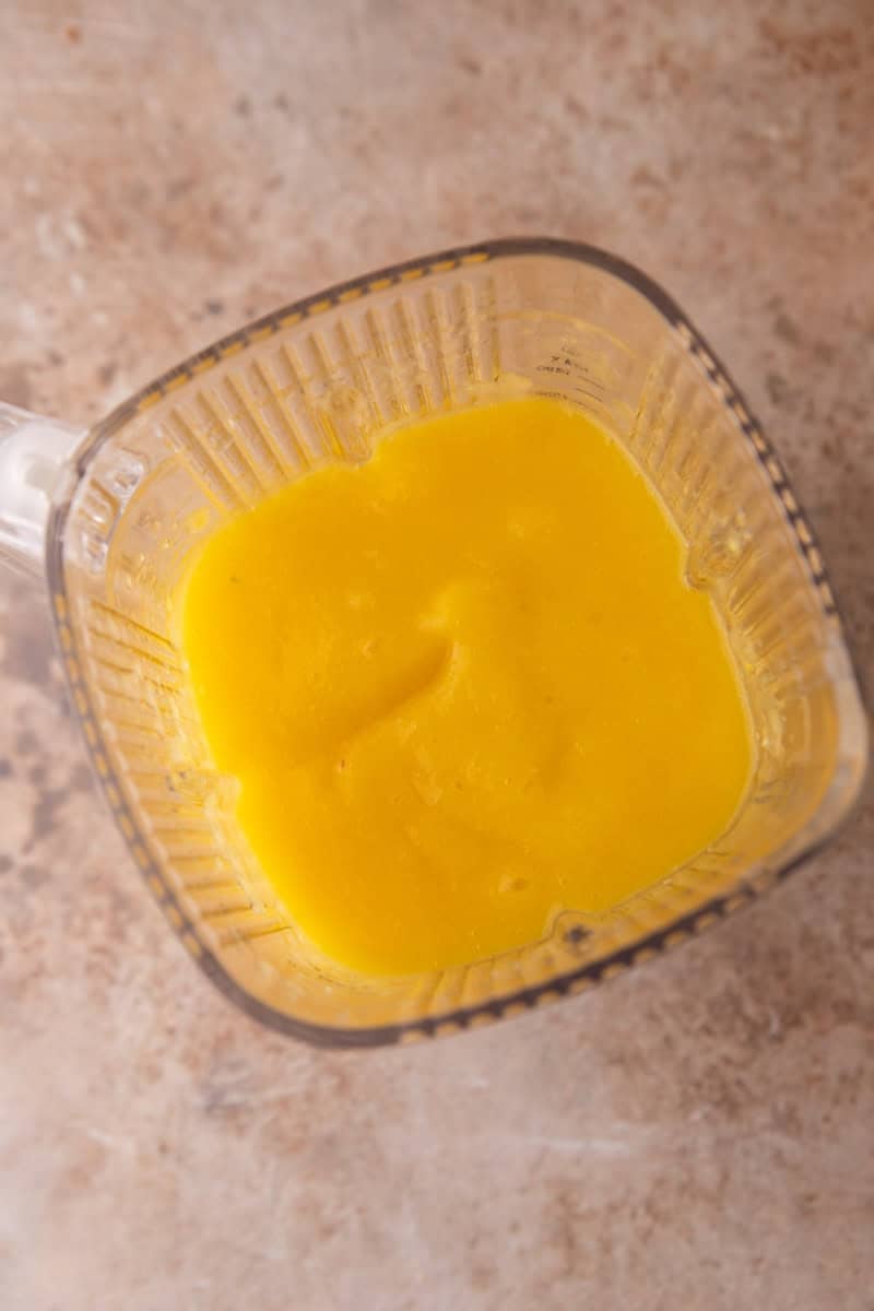 Smooth blended fruit puree in a blender jar