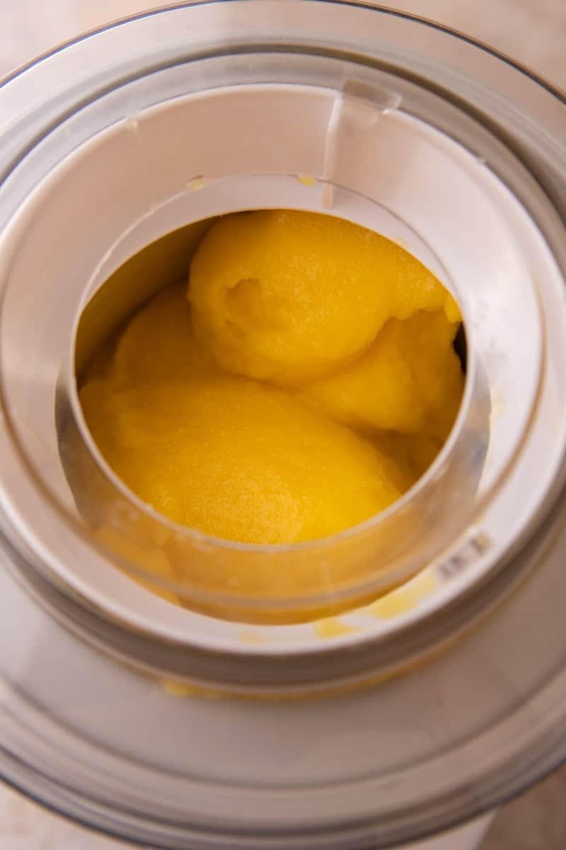 Ice cream machine churning to soft serve consistency in an ice cream maker