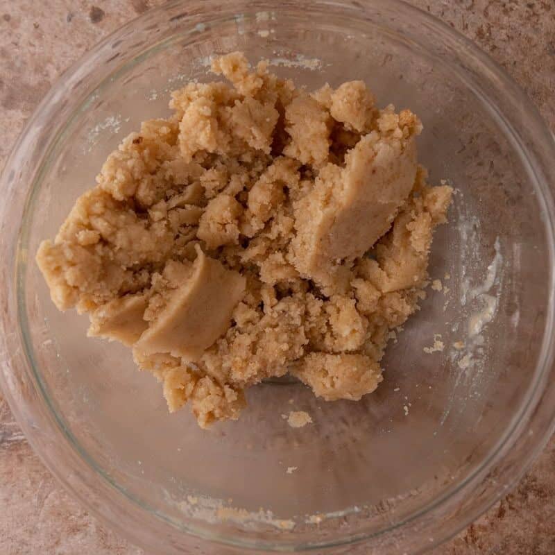 Cookie dough streusel topping mixed into soft crumbly clumps
