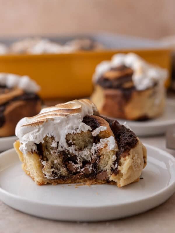 S'mores Cinnamon Rolls on a plate showing the insanely soft interior