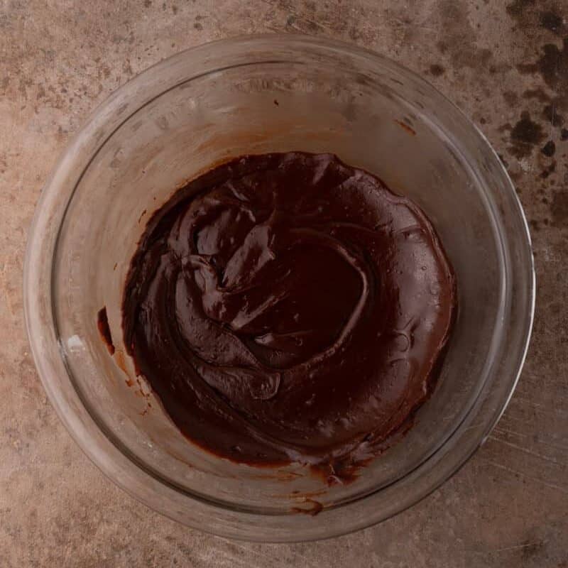 the finished brownie frosting recipe mixture in the bowl