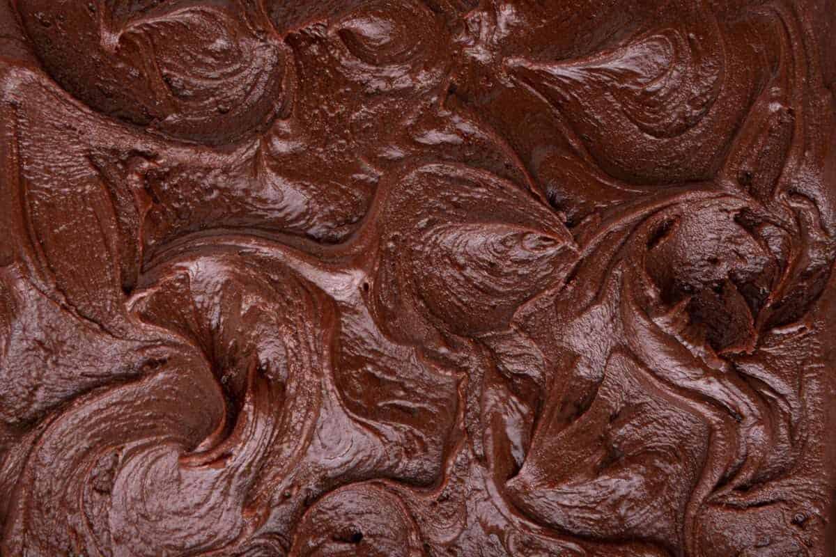 a solidified coating of brownie frosting