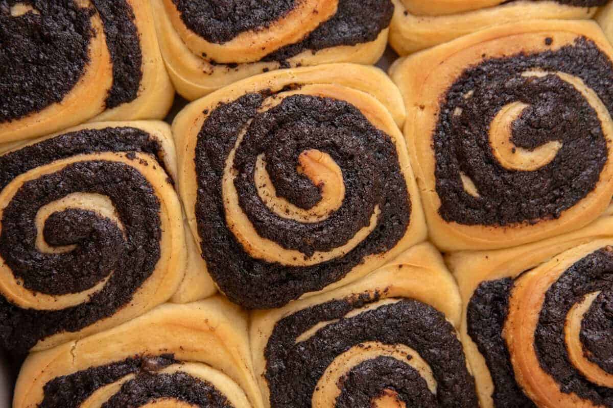 Baked Oreo cinnamon rolls with golden dough and dark Oreo filling swirls