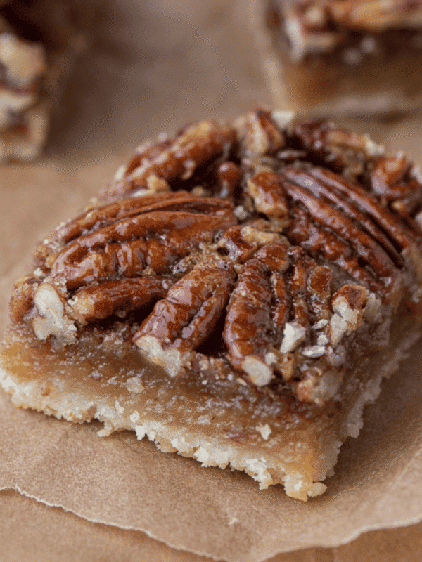 Easy pecan pie bars with shortbread crust and gooey pecan filling.